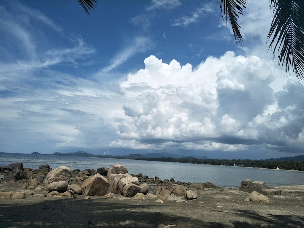 Pesona Pantai Batu Pinagut: Surga Tersembunyi di Bolaang Mongondow Utara