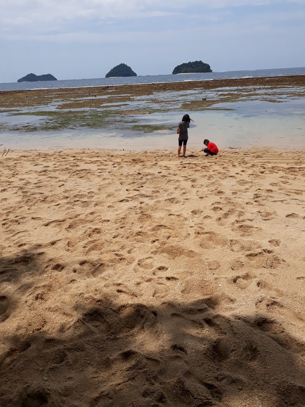 Pesona Pantai Pasir Putih: Surga Tersembunyi di Bolaang Mongondow